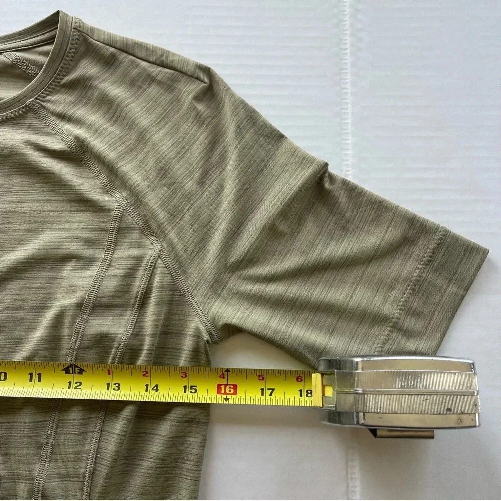 Athleta Pacifica Illume Fitted Olive Half Zip
UPF 50+ Short Sleeve Rashguard - Picture 9 of 10